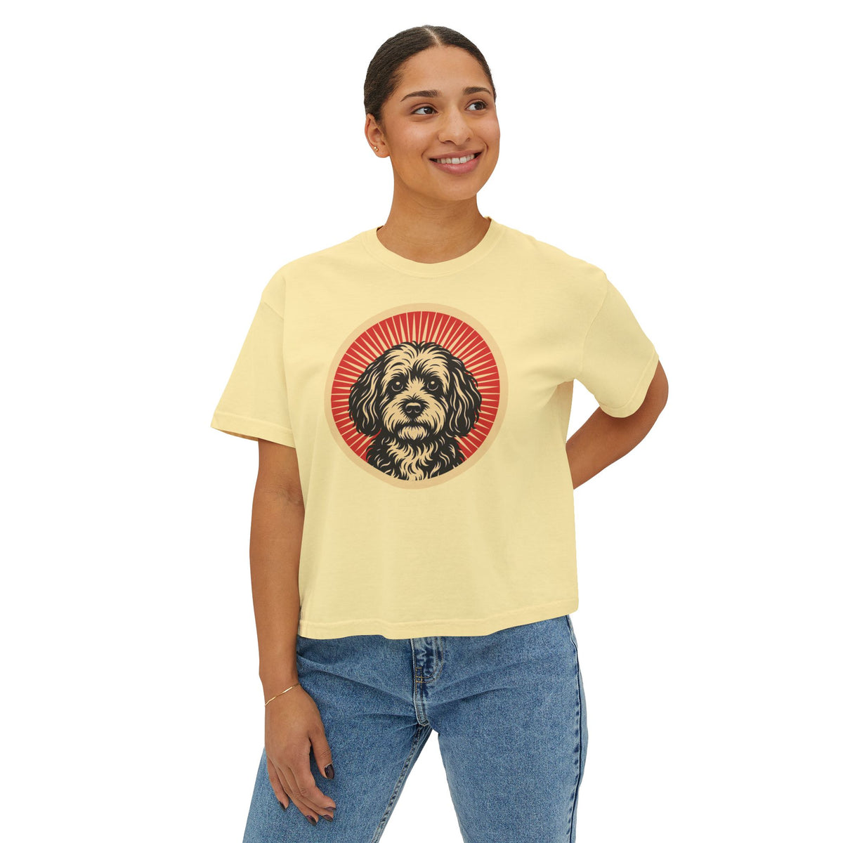 Havapoo badge art in a ring of red rays on a boxy tee