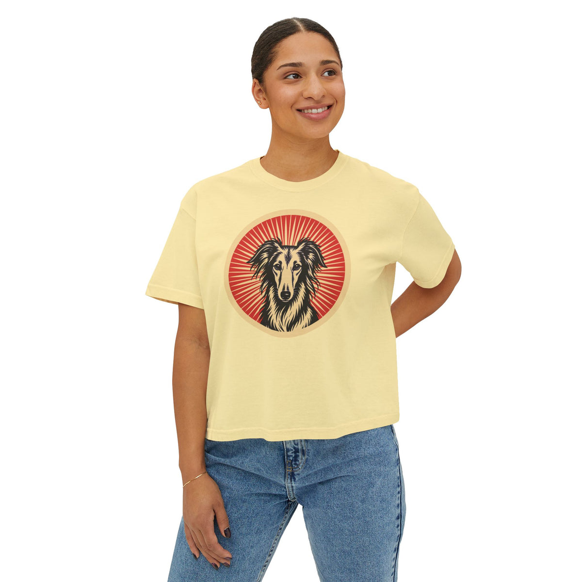 Silken Windhound badge art in a ring of red rays on a boxy tee