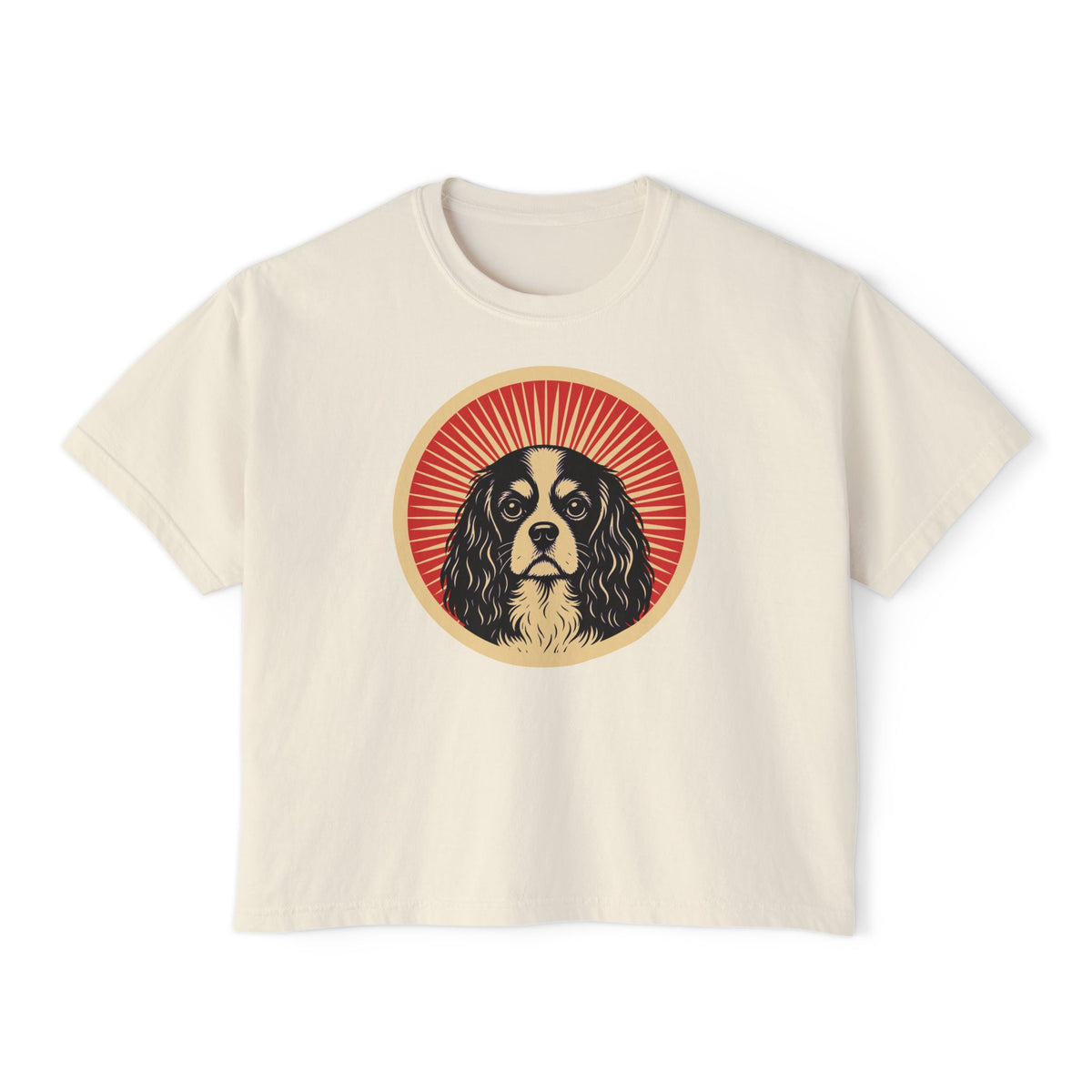 Cavalier King Charles Spaniel badge art in a ring of red rays on a boxy tee